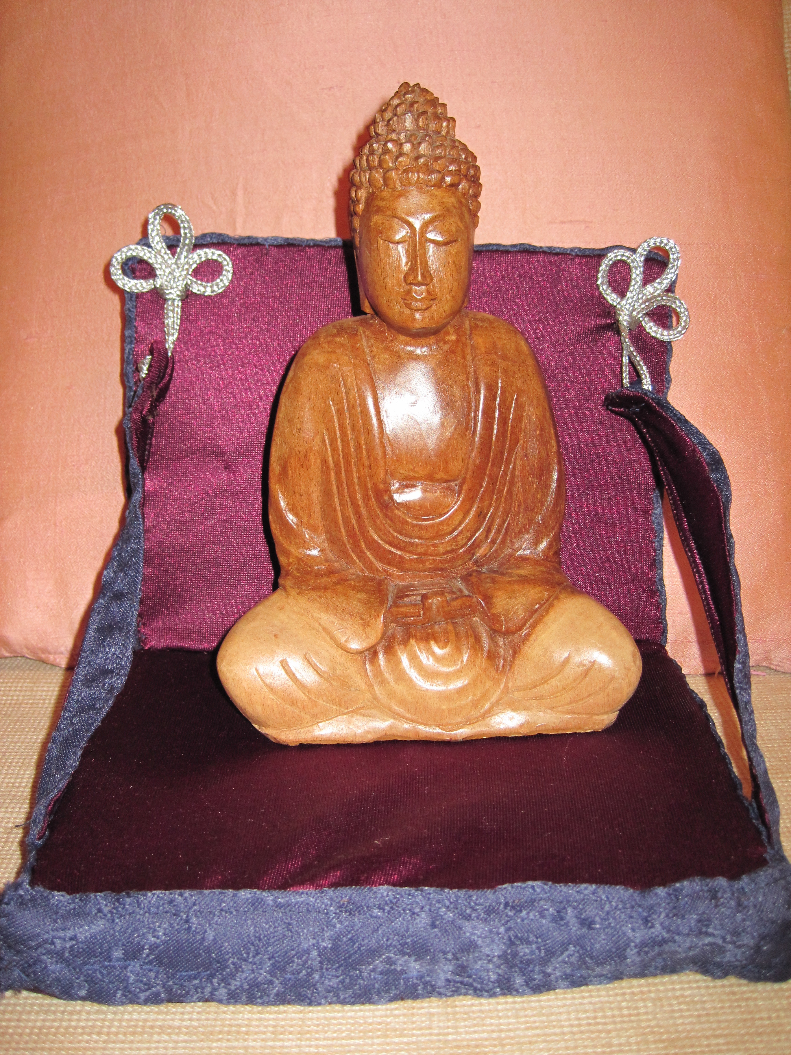 Buddha symbolizes contemplation (sitting on Esther's futon)
